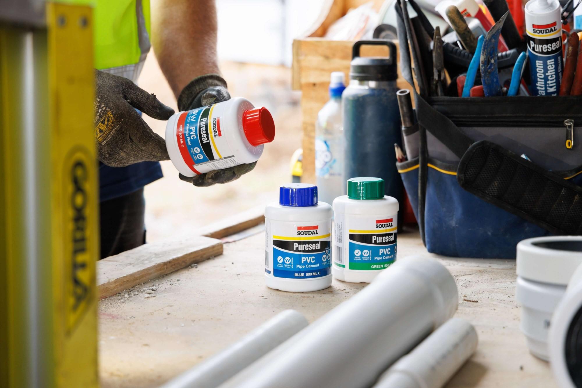 Plumber using Soudal Pureseal PVC range